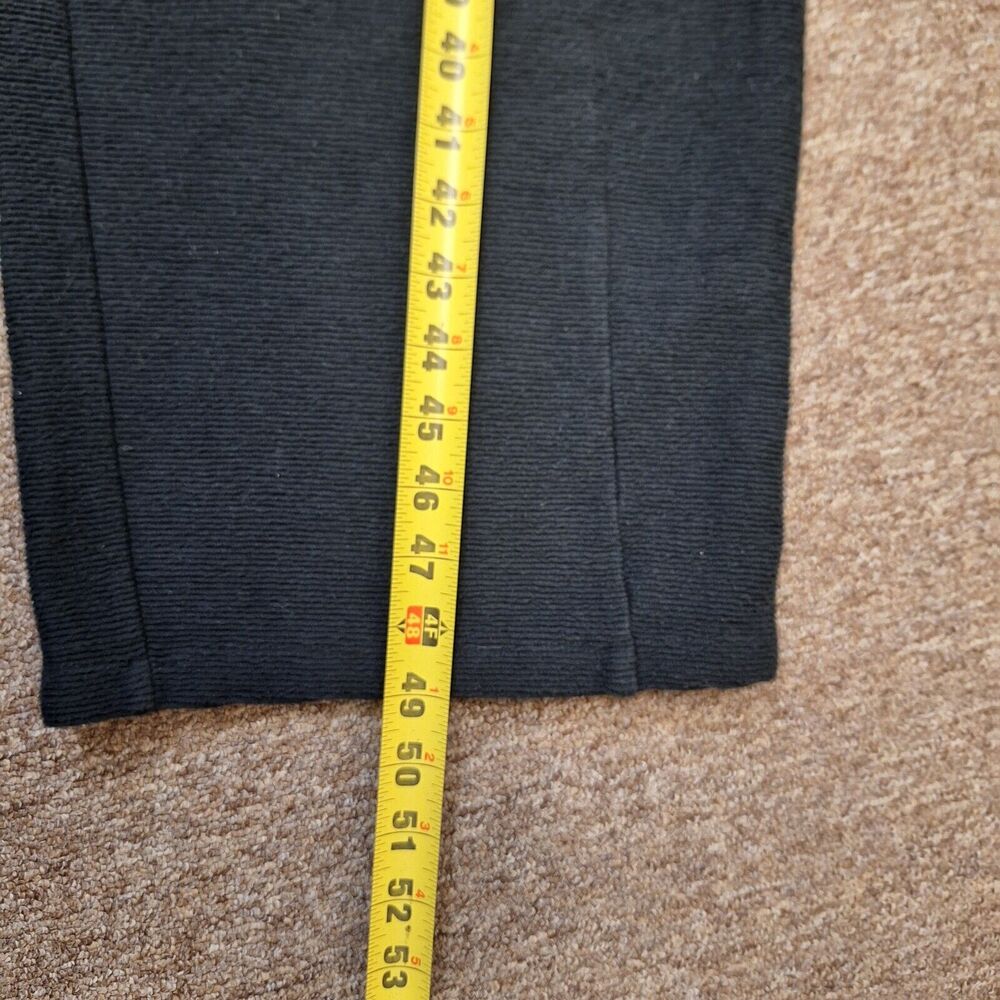 Black Sleeveless Wide-Leg Jumpsuit with Side Tie Detail - Picture 11 of 12